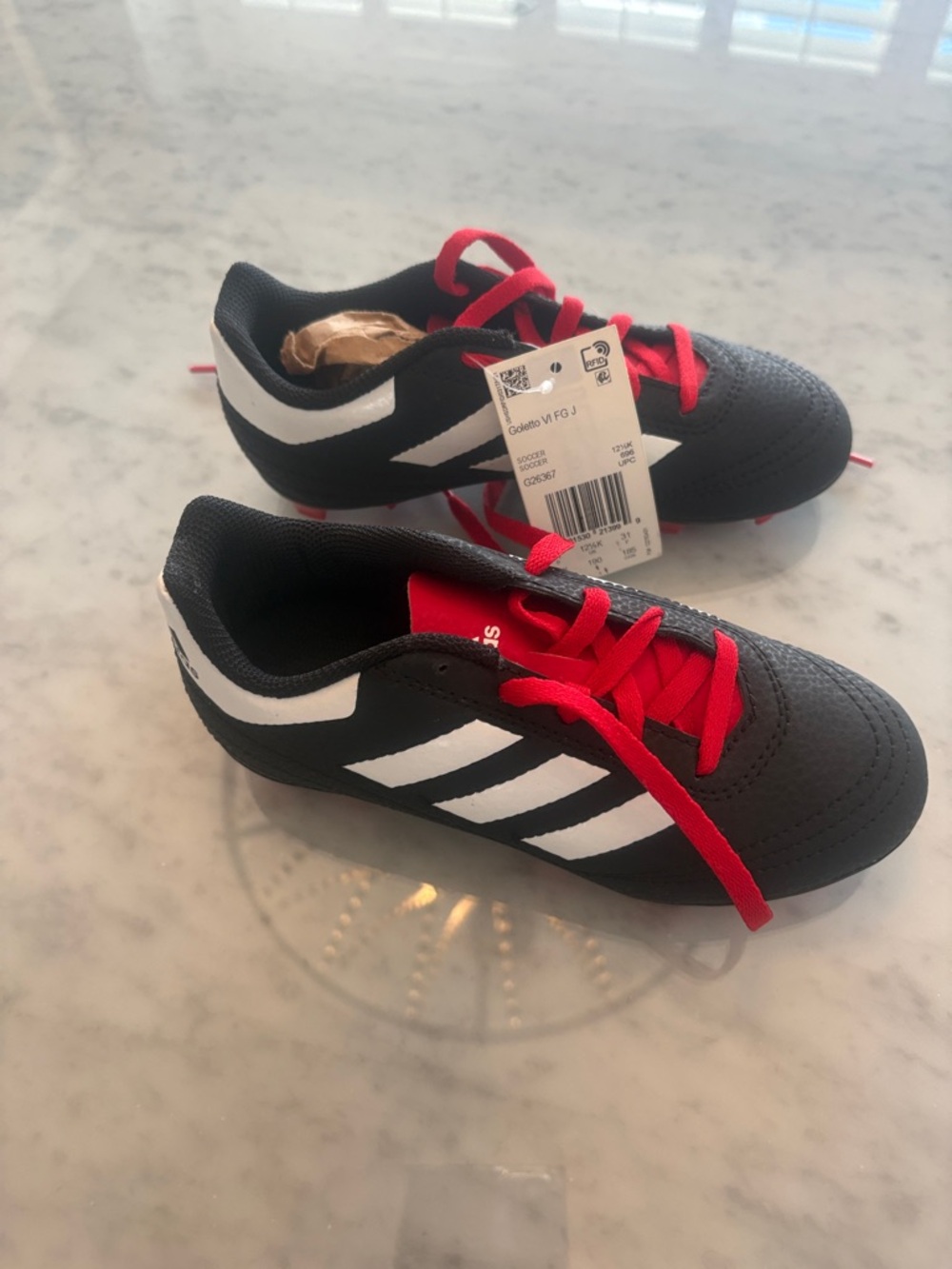 adidas Kids Black & White cleats with Red Laces
